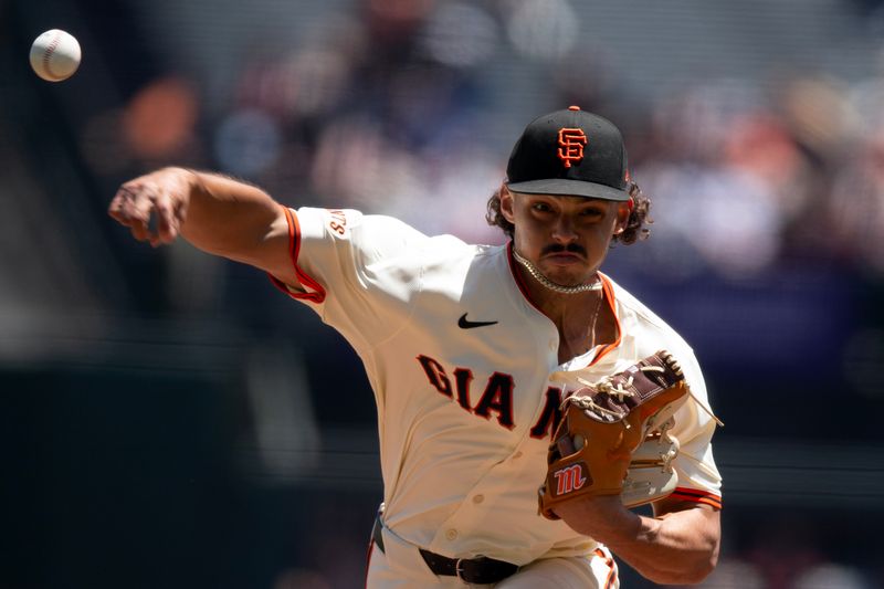 May 14, 2025; San Francisco, California, USA; San Francisco Giants starting pitcher Jordan Hicks (12) delivers a pitch against the Arizona Diamondbacks during the first inning at Oracle Park. Mandatory Credit: D. Ross Cameron-Imagn Images