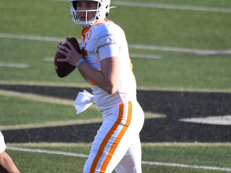 Dec 12, 2020; Nashville, Tennessee, USA; Tennessee Volunteers quarterback Harrison Bailey (15) drops back to pass during the first half against the Vanderbilt Commodores at Vanderbilt Stadium. Mandatory Credit: Christopher Hanewinckel-USA TODAY Sports