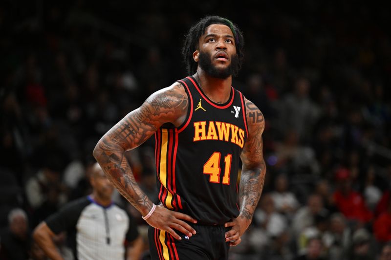 ATLANTA, GEORGIA - JANUARY 12: Saddiq Bey #41 of the Atlanta Hawks looks on during the game against the Indiana Pacers on January 12, 2024 at State Farm Arena in Atlanta, Georgia. NOTE TO USER: User expressly acknowledges and agrees that, by downloading and or using this photograph, User is consenting to the terms and conditions of the Getty Images License Agreement. (Photo by Paras Griffin/Getty Images)