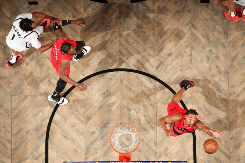 BROOKLYN, NY - OCTOBER 18: Scottie Barnes #4 of the Toronto Raptors rebounds the ball during the game on October 18, 2024 at Barclays Center in Brooklyn, New York. NOTE TO USER: User expressly acknowledges and agrees that, by downloading and or using this Photograph, user is consenting to the terms and conditions of the Getty Images License Agreement. Mandatory Copyright Notice: Copyright 2024 NBAE (Photo by Nathaniel S. Butler/NBAE via Getty Images)