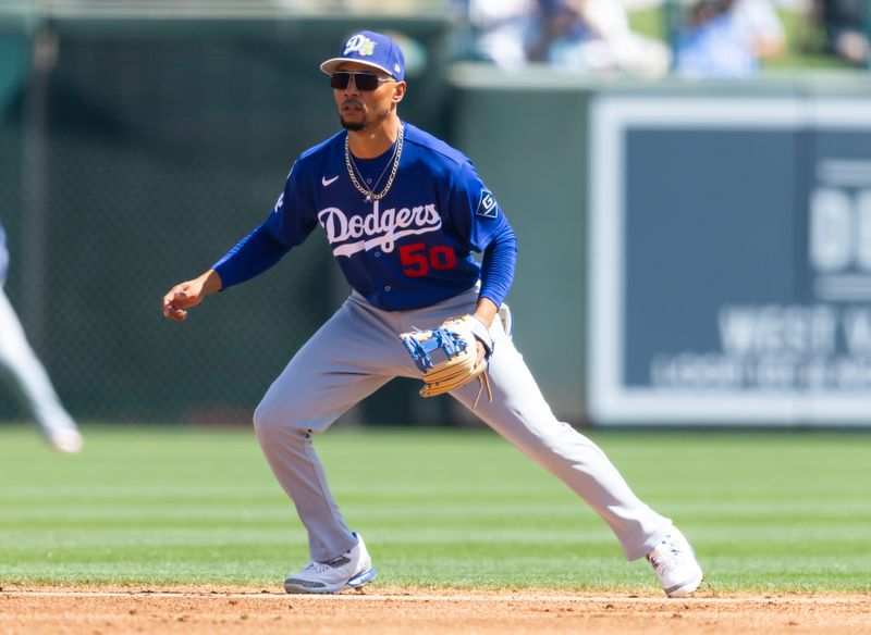 Mar 14, 2026; Phoenix, Arizona, USA; Los Angeles Dodgers shortstop Mookie Betts against the Chicago White Sox during a spring training game at Camelback Ranch-Glendale. Mandatory Credit: Mark J. Rebilas-Imagn Images