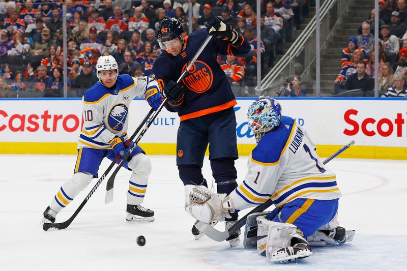 Mar 21, 2024; Edmonton, Alberta, CAN; Edmonton Oilers forward Corey Perry (90) tries to deflect a shot on Buffalo Sabres goaltender Ukko-Pekka Luukkonen (1) during the first period at Rogers Place. Mandatory Credit: Perry Nelson-USA TODAY Sports