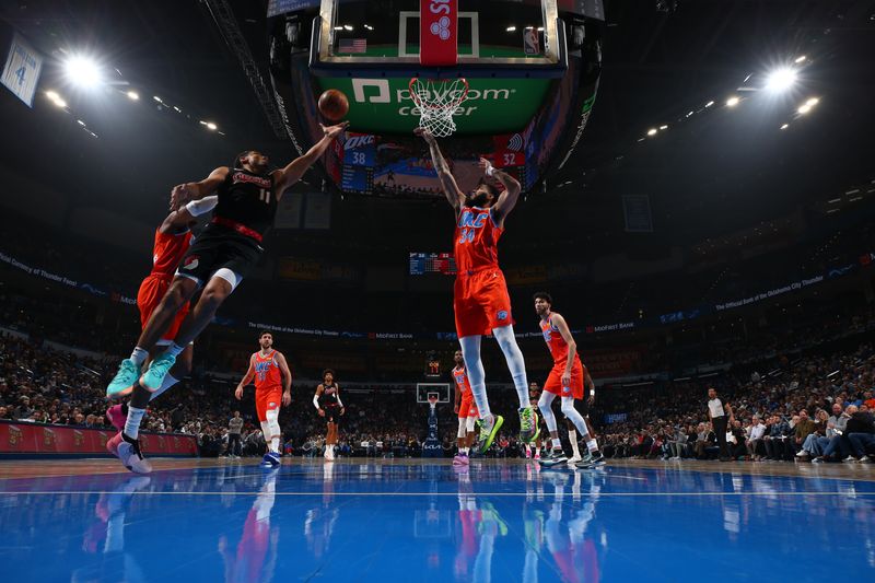 OKLAHOMA CITY, OK - JANUARY 23: Malcolm Brogdon #11 of the Portland Trail Blazers shoots the ball during the game against the Oklahoma City Thunder on January 23, 2024 at Paycom Arena in Oklahoma City, Oklahoma. NOTE TO USER: User expressly acknowledges and agrees that, by downloading and or using this photograph, User is consenting to the terms and conditions of the Getty Images License Agreement. Mandatory Copyright Notice: Copyright 2024 NBAE (Photo by Zach Beeker/NBAE via Getty Images)