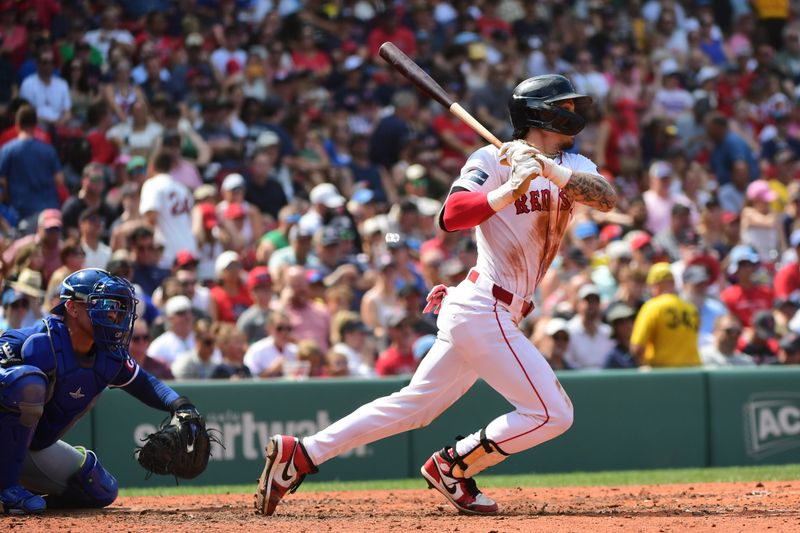 Jul 14, 2024; Boston, Massachusetts, USA; Boston Red Sox center fielder Jarren Duran (16) hits a single during the sixth inning against the Kansas City Royals at Fenway Park. Mandatory Credit: Bob DeChiara-USA TODAY Sports