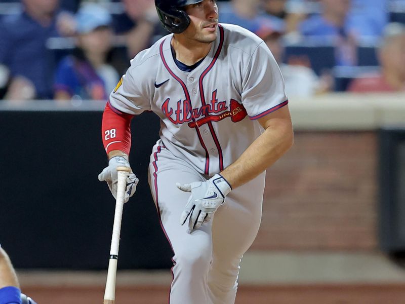 Jun 24, 2025; New York City, New York, USA; Atlanta Braves first baseman Matt Olson (28) watches his two run single against the New York Mets during the sixth inning at Citi Field. Mandatory Credit: Brad Penner-Imagn Images
