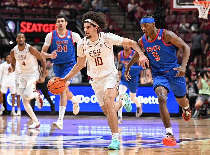 Mar 7, 2026; Tallahassee, Florida, USA; Florida State Seminoles guard Lajae Jones (10) drives the ball up the court past Southern Methodist Mustangs guard Jaron Pierre Jr. (5) during the first half at Donald L. Tucker Center. Mandatory Credit: Melina Myers-Imagn Images