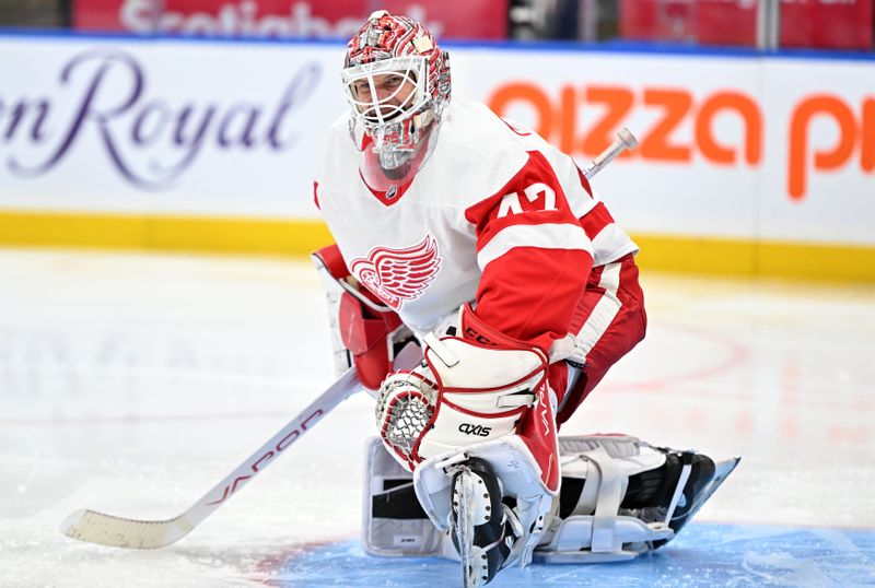 Jan 14, 2024; Toronto, Ontario, CAN;  Detroit Red Wings goalie James Reimer (47) grimaces as he stretches in the third period against the Toronto Maple Leafs at Scotiabank Arena. Mandatory Credit: Dan Hamilton-USA TODAY Sports