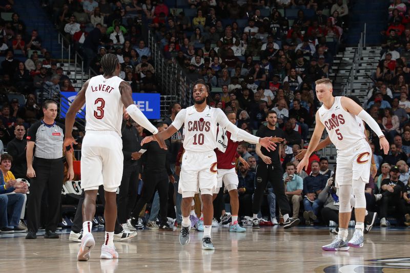 NEW ORLEANS, LA - MARCH 13: Darius Garland #10 of the Cleveland Cavaliers high fives Sam Merrill #5 and Caris LeVert #3 during the game against the New Orleans Pelicans on March 13, 2024 at the Smoothie King Center in New Orleans, Louisiana. NOTE TO USER: User expressly acknowledges and agrees that, by downloading and or using this Photograph, user is consenting to the terms and conditions of the Getty Images License Agreement. Mandatory Copyright Notice: Copyright 2024 NBAE (Photo by Layne Murdoch Jr./NBAE via Getty Images)