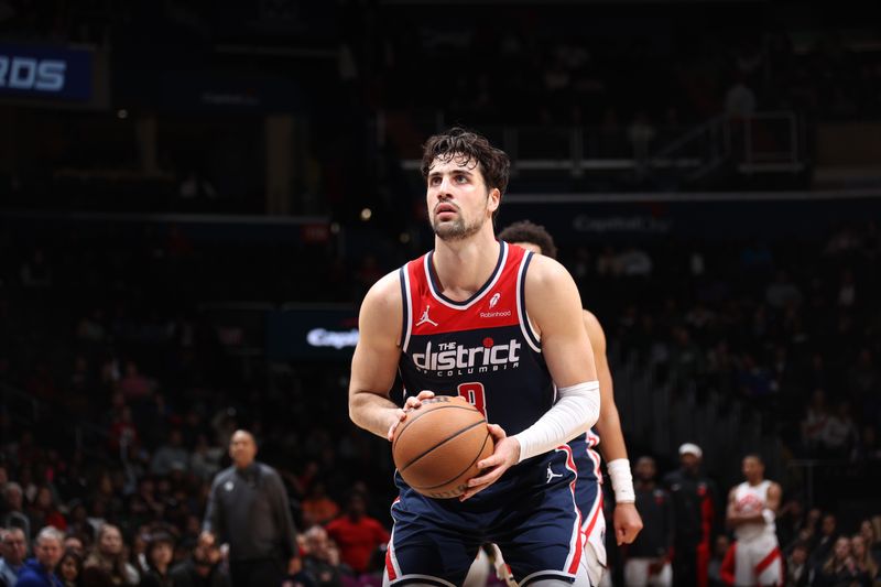 WASHINGTON, DC -? MARCH 23:  Deni Avdija #8 of the Washington Wizards shoots a free throw during the game on March 23, 2024 at Capital One Arena in Washington, DC. NOTE TO USER: User expressly acknowledges and agrees that, by downloading and or using this Photograph, user is consenting to the terms and conditions of the Getty Images License Agreement. Mandatory Copyright Notice: Copyright 2024 NBAE (Photo by Stephen Gosling/NBAE via Getty Images)