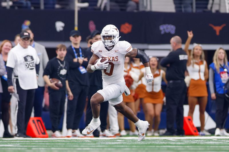 Dec 2, 2023; Arlington, TX, USA; Texas Longhorns tight end Ja'Tavion Sanders (0) makes a reception against the Oklahoma State Cowboys during the third quarter at AT&T Stadium. Mandatory Credit: Andrew Dieb-USA TODAY Sports