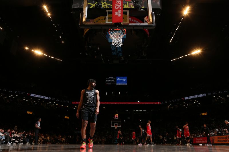 BROOKLYN, NY - MARCH 29: Cam Thomas #24 of the Brooklyn Nets looks on during the game against the Chicago Bulls on March 29, 2024 at Barclays Center in Brooklyn, New York. NOTE TO USER: User expressly acknowledges and agrees that, by downloading and or using this Photograph, user is consenting to the terms and conditions of the Getty Images License Agreement. Mandatory Copyright Notice: Copyright 2024 NBAE (Photo by Nathaniel S. Butler/NBAE via Getty Images)