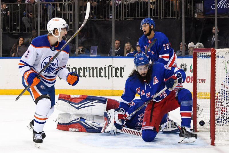 Dec 22, 2023; New York, New York, USA;  Edmonton Oilers center Ryan McLeod (71) celebrates his goal against the New York Rangers during the third period at Madison Square Garden. Mandatory Credit: Dennis Schneidler-USA TODAY Sports