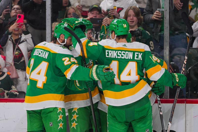 Dec 23, 2023; Saint Paul, Minnesota, USA; Minnesota Wild celebrates left wing Kirill Kaprizov (97) goal against the Boston Bruins in the second period at Xcel Energy Center. Mandatory Credit: Brad Rempel-USA TODAY Sports