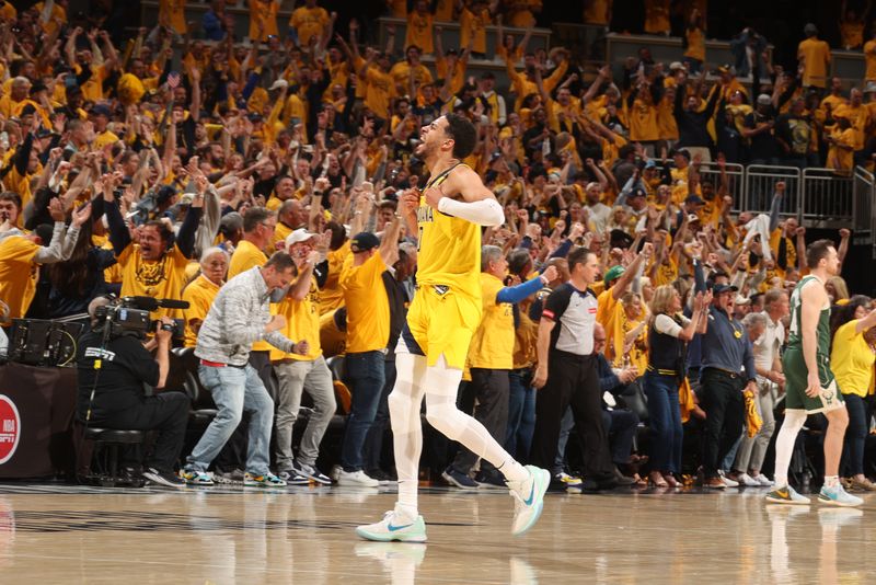 INDIANAPOLIS, IN - APRIL 26: Tyrese Haliburton #0 of the Indiana Pacers celebrates after hitting the game winning shot during the game against the Milwaukee Bucks during Round 1 Game 3 of the 2024 NBA Playoffs on April 26, 2024 at Gainbridge Fieldhouse in Indianapolis, Indiana. NOTE TO USER: User expressly acknowledges and agrees that, by downloading and or using this Photograph, user is consenting to the terms and conditions of the Getty Images License Agreement. Mandatory Copyright Notice: Copyright 2023 NBAE (Photo by Nathaniel S. Butler/NBAE via Getty Images)