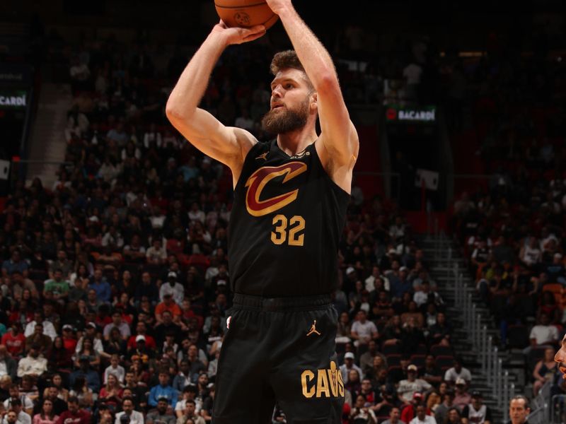 MIAMI, FL - DECEMBER 8: Dean Wade #32 of the Cleveland Cavaliers shoots a three point basket during the game against the Miami Heat on December 8, 2024 at Kaseya Center in Miami, Florida. NOTE TO USER: User expressly acknowledges and agrees that, by downloading and or using this Photograph, user is consenting to the terms and conditions of the Getty Images License Agreement. Mandatory Copyright Notice: Copyright 2024 NBAE (Photo by Issac Baldizon/NBAE via Getty Images)