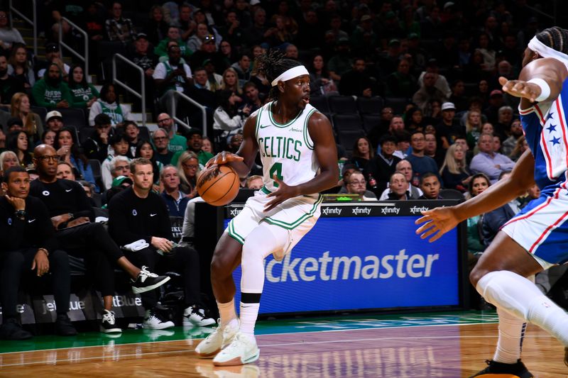 BOSTON, MA - OCTOBER 12: Jrue Holiday #4 of the Boston Celtics handles the ball during the game against the Philadelphia 76ers during a NBA Preseason game on October 12, 2024 at TD Garden in Boston, Massachusetts. NOTE TO USER: User expressly acknowledges and agrees that, by downloading and/or using this Photograph, user is consenting to the terms and conditions of the Getty Images License Agreement. Mandatory Copyright Notice: Copyright 2024 NBAE (Photo by Brian Babineau/NBAE via Getty Images)