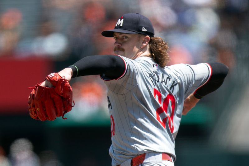 Jul 14, 2024; San Francisco, California, USA; Minnesota Twins starting pitcher Chris Paddack (20) delivers a pitch against the San Francisco Giants during the first inning at Oracle Park. Mandatory Credit: D. Ross Cameron-USA TODAY Sports