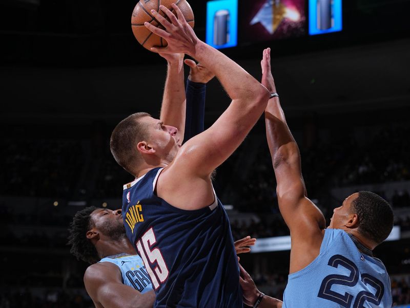 DENVER, CO - MARCH 25: Nikola Jokic #15 of the Denver Nuggets shoots the ball during the game against the Memphis Grizzlies on March 25, 2024 at the Ball Arena in Denver, Colorado. NOTE TO USER: User expressly acknowledges and agrees that, by downloading and/or using this Photograph, user is consenting to the terms and conditions of the Getty Images License Agreement. Mandatory Copyright Notice: Copyright 2024 NBAE (Photo by Bart Young/NBAE via Getty Images)