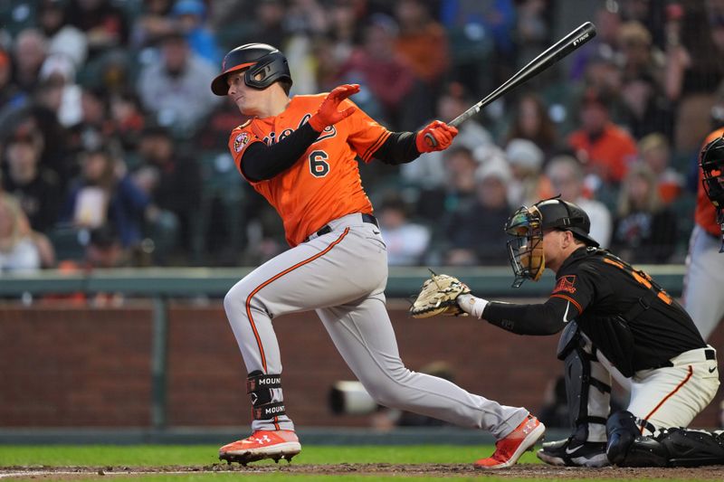 Jun 3, 2023; San Francisco, California, USA;  Baltimore Orioles first baseman Ryan Mountcastle (6) hits a single against the San Francisco Giants during the fifth inning at Oracle Park. Mandatory Credit: Darren Yamashita-USA TODAY Sports