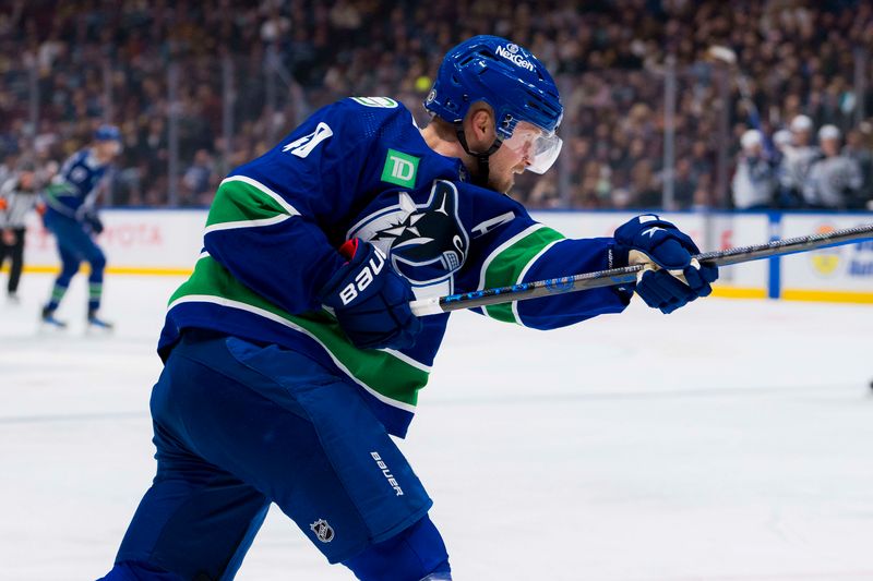 Feb 17, 2024; Vancouver, British Columbia, CAN; Vancouver Canucks forward Elias Pettersson (40) shoots against the Winnipeg Jets in the second period at Rogers Arena. Mandatory Credit: Bob Frid-USA TODAY Sports