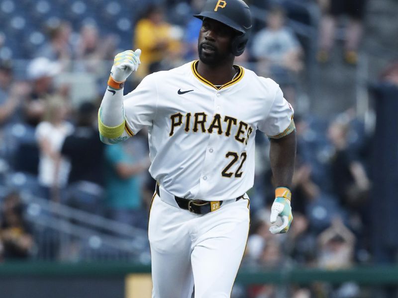 Jul 2, 2024; Pittsburgh, Pennsylvania, USA;  Pittsburgh Pirates designated hitter Andrew McCutchen (22) circles the bases on a solo home run against the St. Louis Cardinals during the fifth inning at PNC Park. Mandatory Credit: Charles LeClaire-USA TODAY Sports