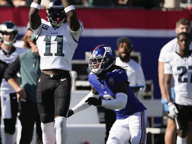 Philadelphia Eagles wide receiver A.J. Brown (11) makes a catch against the New York Giants during the first quarter of an NFL football game, Sunday, Oct. 20, 2024, in East Rutherford, N.J. (AP Photo/Seth Wenig)