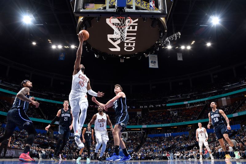 ORLANDO, FL - JANUARY 22:  Donovan Mitchell #45 of the Cleveland Cavaliers drives to the basket during the game against the Orlando Magic on January 22, 2024 at Kia Center in Orlando, Florida. NOTE TO USER: User expressly acknowledges and agrees that, by downloading and or using this photograph, User is consenting to the terms and conditions of the Getty Images License Agreement. Mandatory Copyright Notice: Copyright 2024 NBAE (Photo by Fernando Medina/NBAE via Getty Images)