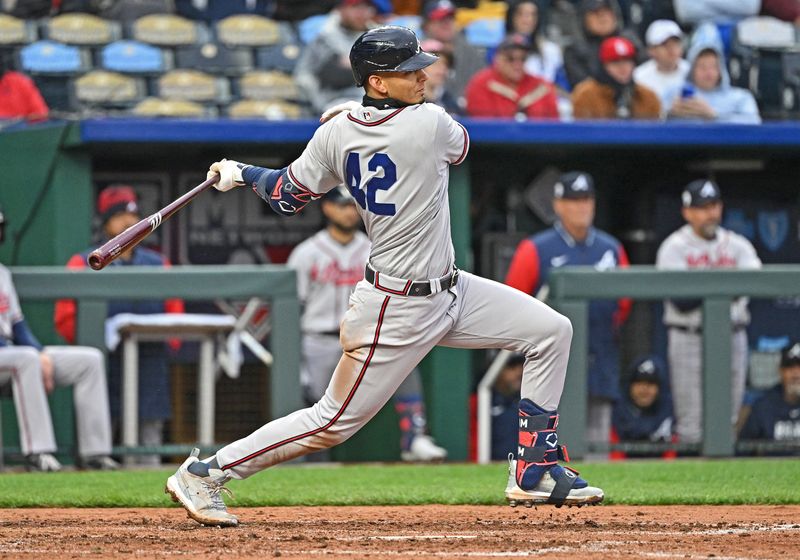 Apr 15, 2023; Kansas City, Missouri, USA;  Atlanta Braves Vaughn Grissom (15) singles during the fifth inning against the Kansas City Royals at Kauffman Stadium. Mandatory Credit: Peter Aiken-USA TODAY Sports