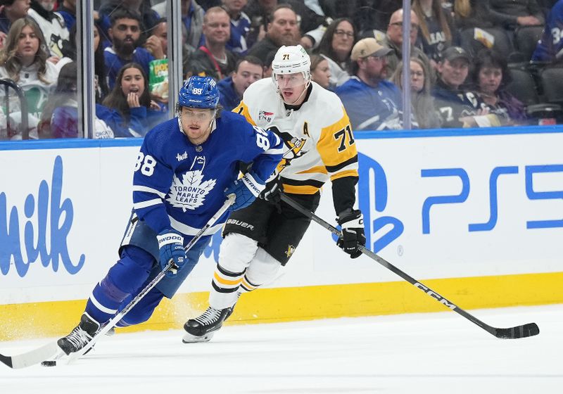 Apr 8, 2024; Toronto, Ontario, CAN; Toronto Maple Leafs right wing William Nylander (88) skates with the puck as Pittsburgh Penguins center Evgeni Malkin (71) gives chase during the third period at Scotiabank Arena. Mandatory Credit: Nick Turchiaro-USA TODAY Sports
