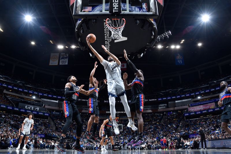 ORLANDO, FL - NOVEMBER 23: Goga Bitadze #35 of the Orlando Magic drives to the basket during the game against the Detroit Pistons on November 23, 2024 at Kia Center in Orlando, Florida. NOTE TO USER: User expressly acknowledges and agrees that, by downloading and or using this photograph, User is consenting to the terms and conditions of the Getty Images License Agreement. Mandatory Copyright Notice: Copyright 2024 NBAE (Photo by Fernando Medina/NBAE via Getty Images)