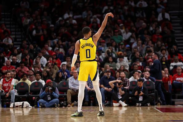 HOUSTON, TEXAS - DECEMBER 26: Tyrese Haliburton #0 of the Indiana Pacers reacts after making a three point shot against the Houston Rockets in the second half at Toyota Center on December 26, 2023 in Houston, Texas.  NOTE TO USER: User expressly acknowledges and agrees that, by downloading and or using this photograph, User is consenting to the terms and conditions of the Getty Images License Agreement. (Photo by Tim Warner/Getty Images)