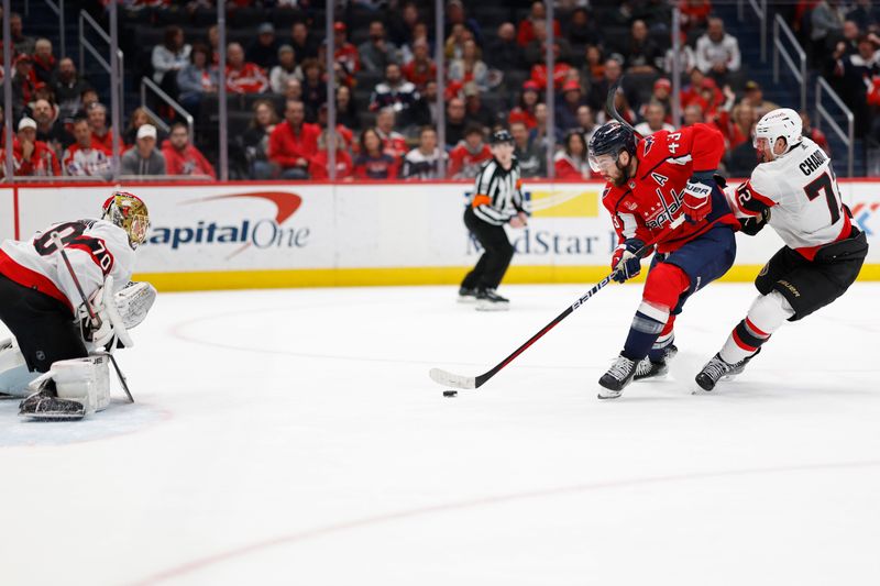 Feb 26, 2024; Washington, District of Columbia, USA; Washington Capitals right wing Tom Wilson (43) skates in on Ottawa Senators goaltender Joonas Korpisalo (70) as Senators defenseman Thomas Chabot (72) defends in the third period at Capital One Arena. Mandatory Credit: Geoff Burke-USA TODAY Sports