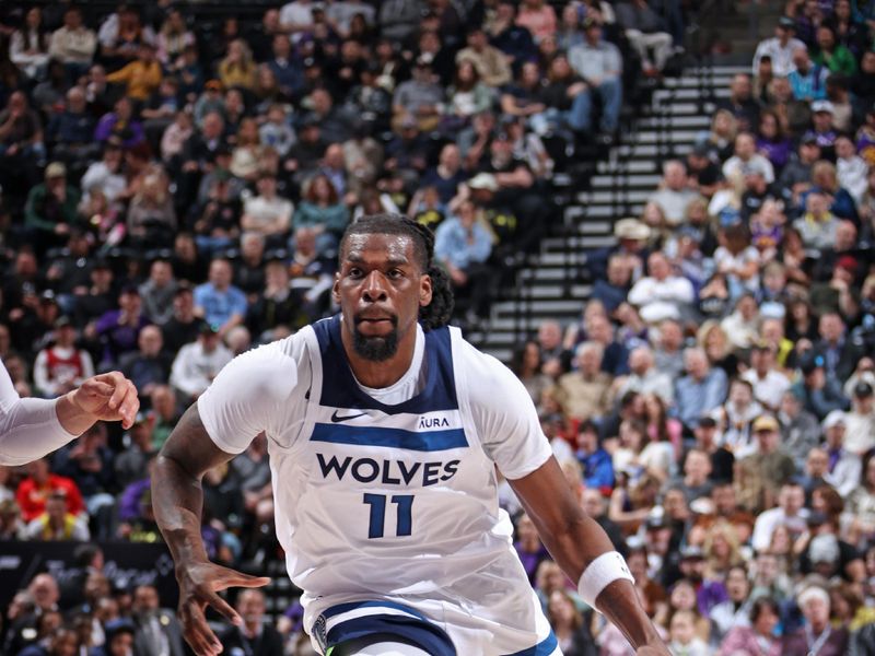 SALT LAKE CITY, UT - MARCH 18: Naz Reid #11 of the Minnesota Timberwolves handles the ball during the game against the Utah Jazz on March 18, 2024 at Delta Center in Salt Lake City, Utah. NOTE TO USER: User expressly acknowledges and agrees that, by downloading and or using this Photograph, User is consenting to the terms and conditions of the Getty Images License Agreement. Mandatory Copyright Notice: Copyright 2024 NBAE (Photo by Melissa Majchrzak/NBAE via Getty Images)