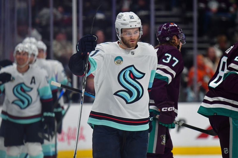 Apr 5, 2024; Anaheim, California, USA; Seattle Kraken center Shane Wright (51) celebrates his goal scored against the Anaheim Ducks during the second period at Honda Center. Mandatory Credit: Gary A. Vasquez-USA TODAY Sports