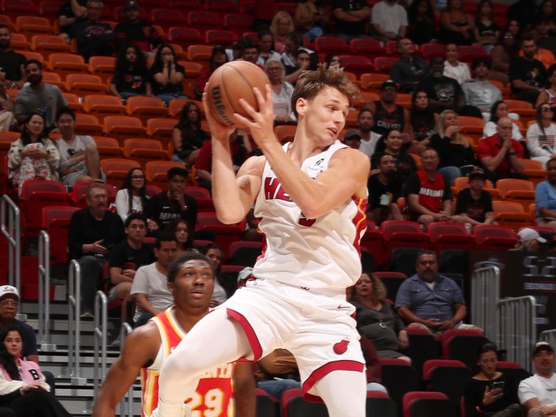 MIAMI, FL - OCTOBER 16: Pelle Larsson #9 of the Miami Heat looks to pass the ball during the game against the Atlanta Hawks on October 16, 2024 at Miami-Dade Arena in Miami, Florida. NOTE TO USER: User expressly acknowledges and agrees that, by downloading and or using this Photograph, user is consenting to the terms and conditions of the Getty Images License Agreement. Mandatory Copyright Notice: Copyright 2024 NBAE (Photo by Issac Baldizon/NBAE via Getty Images)