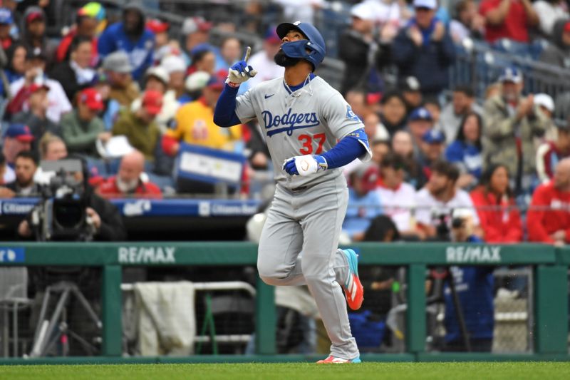 Apr 6, 2025; Philadelphia, Pennsylvania, USA; Los Angeles Dodgers outfielder Teoscar Hernández (37) celebrates his two-run home run during the first inning against the Philadelphia Phillies at Citizens Bank Park. Mandatory Credit: Eric Hartline-Imagn Images