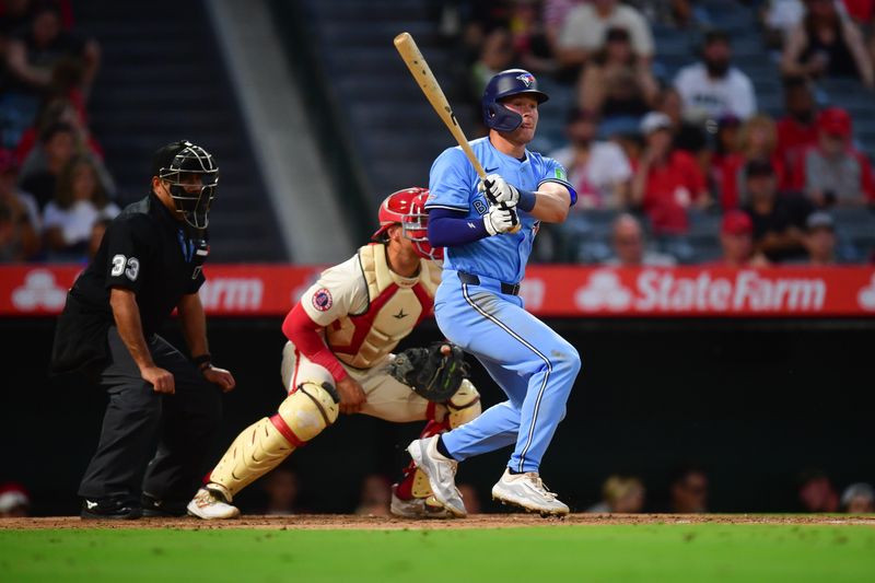 Aug 12, 2024; Anaheim, California, USA; Toronto Blue Jays second baseman Will Wagner (7) hits a single against the Los Angeles Angels during the fifth inning at Angel Stadium. Mandatory Credit: Gary A. Vasquez-USA TODAY Sports