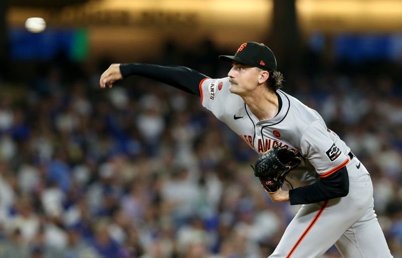 Jul 23, 2024; Los Angeles, California, USA; San Francisco Giants pitcher Sean Hjelle (64) throws during the fifth inning against the Los Angeles Dodgers at Dodger Stadium. Mandatory Credit: Jason Parkhurst-USA TODAY Sports