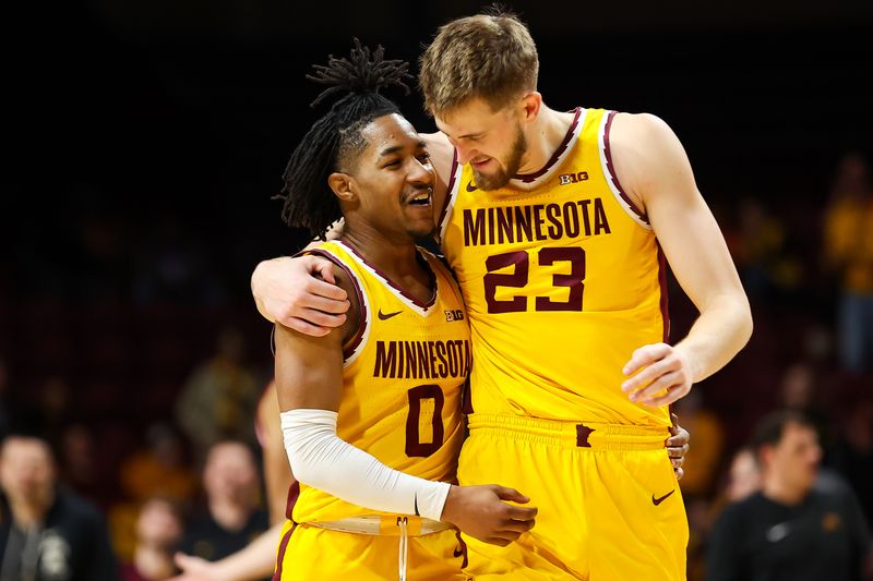 Dec 12, 2023; Minneapolis, Minnesota, USA; Minnesota Golden Gophers guard Elijah Hawkins (0) and forward Parker Fox (23) celebrate during the second half against the IUPUI Jaguars at Williams Arena. Mandatory Credit: Matt Krohn-USA TODAY Sports