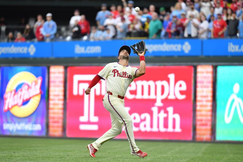 May 6, 2024; Philadelphia, Pennsylvania, USA; Philadelphia Phillies outfielder Whit Merrifield (9) catches final out in the ninth inning of win against the San Francisco Giants at Citizens Bank Park. Mandatory Credit: Eric Hartline-USA TODAY Sports