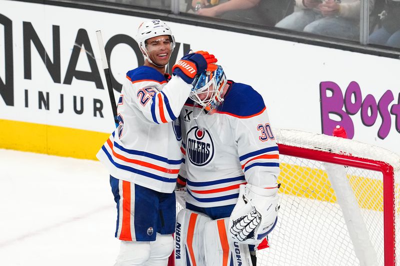 Apr 1, 2025; Las Vegas, Nevada, USA; Edmonton Oilers defenseman Darnell Nurse (25) celebrates with Edmonton Oilers goaltender Calvin Pickard (30) after the Oilers defeat the Vegas Golden Knights at T-Mobile Arena. Mandatory Credit: Stephen R. Sylvanie-Imagn Images
