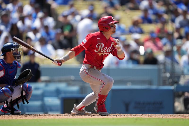 Jul 30, 2023; Los Angeles, California, USA; Cincinnati Reds center fielder TJ Friedl (29) hits a run-scoring single in the sixth inning against the Los Angeles Dodgers at Dodger Stadium. Mandatory Credit: Kirby Lee-USA TODAY Sports