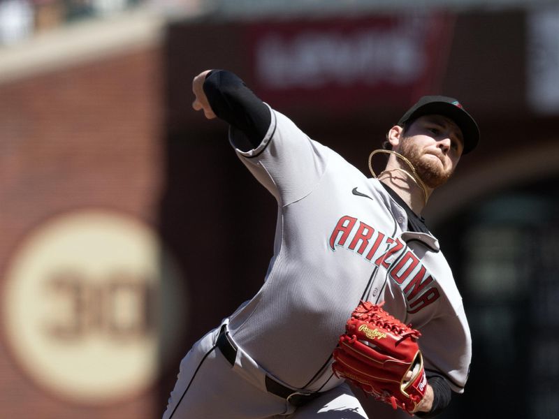 May 14, 2025; San Francisco, California, USA; Arizona Diamondbacks pitcher Ryne Nelson (19) delivers a pitch against the San Francisco Giants during the seventh inning at Oracle Park. Mandatory Credit: D. Ross Cameron-Imagn Images