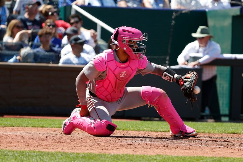 May 11, 2025; Kansas City, Missouri, USA; Boston Red Sox catcher Carlos Narváez (75) wears pink catchers gear for Mothers Day  at Kauffman Stadium. Mandatory Credit: Gary Rohman-Imagn Images
