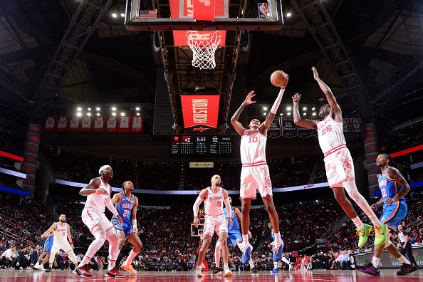 HOUSTON, TX - DECEMBER 6:   Jabari Smith Jr. #10 of the Houston Rockets rebounds the ball during the game against the Oklahoma City Thunder on December 6, 2023 at the Toyota Center in Houston, Texas. NOTE TO USER: User expressly acknowledges and agrees that, by downloading and or using this photograph, User is consenting to the terms and conditions of the Getty Images License Agreement. Mandatory Copyright Notice: Copyright 2023 NBAE (Photo by Michael Gonzales/NBAE via Getty Images)