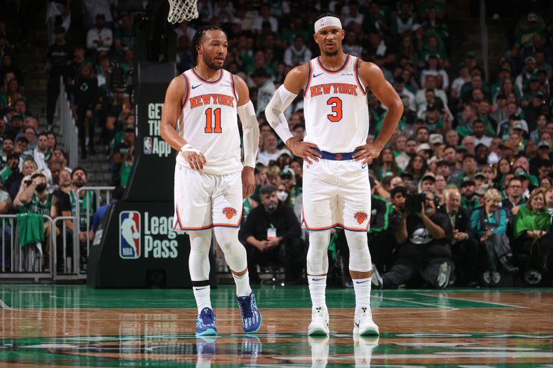 BOSTON, MA - OCTOBER 22: Jalen Brunson #11 and Josh Hart #3 of the New York Knicks look on during the game against the Boston Celtics on October 22, 2024 at TD Garden in Boston, Massachusetts. NOTE TO USER: User expressly acknowledges and agrees that, by downloading and or using this Photograph, user is consenting to the terms and conditions of the Getty Images License Agreement. Mandatory Copyright Notice: Copyright 2024 NBAE (Photo by Nathaniel S. Butler/NBAE via Getty Images)