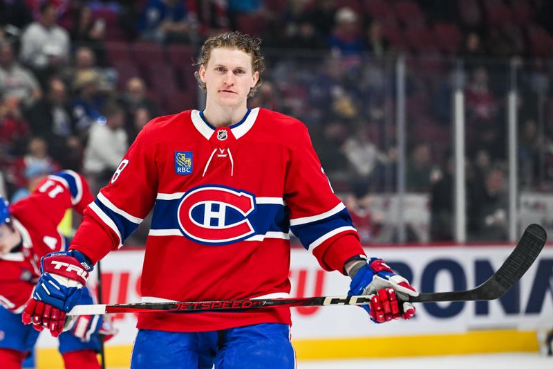 Jan 18, 2025; Montreal, Quebec, CAN; Montreal Canadiens center Christian Dvorak (28) looks on during warm-up before the game against the Toronto Maple Leafs at Bell Centre. Mandatory Credit: David Kirouac-Imagn Images