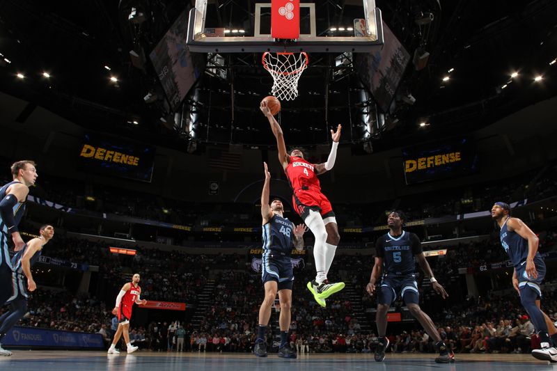 MEMPHIS, TN - FEBRUARY 14: Jalen Green #4 of the Houston Rockets drives to the basket during the game against the Memphis Grizzlies on February 14, 2024 at FedExForum in Memphis, Tennessee. NOTE TO USER: User expressly acknowledges and agrees that, by downloading and or using this photograph, User is consenting to the terms and conditions of the Getty Images License Agreement. Mandatory Copyright Notice: Copyright 2024 NBAE (Photo by Joe Murphy/NBAE via Getty Images)