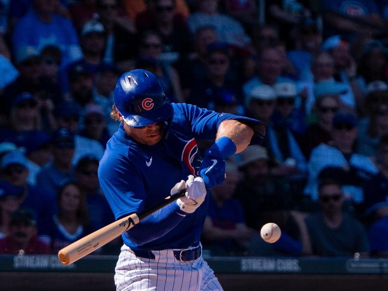 Mar 9, 2024; Mesa, Arizona, USA; Chicago Cubs infielder Nico Hoerner (2) bats against the Colorado Rockies in the fourth inning during a spring training game at Sloan Park. Mandatory Credit: Allan Henry-USA TODAY Sports