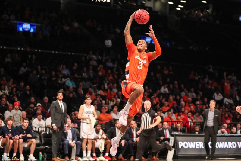 Nov 21, 2022; Brooklyn, New York, USA;  Syracuse Orange guard Judah Mintz (3) goes up for a dunk in the first half against the Richmond Spiders at Barclays Center. Mandatory Credit: Wendell Cruz-USA TODAY Sports